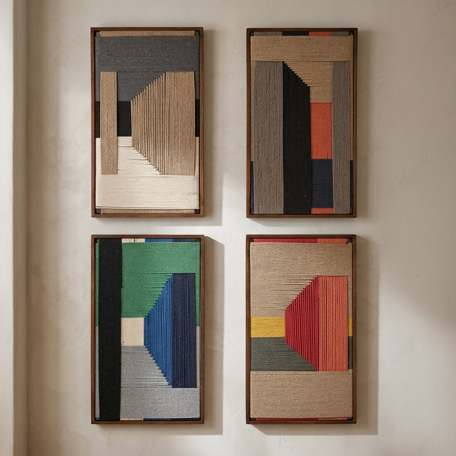 Four framed abstract wall art pieces arranged in a 2x2 grid on a warm beige wall. Each piece features geometric shapes and textured vertical ribbed patterns in earthy tones, with one including green, blue, and red accents.