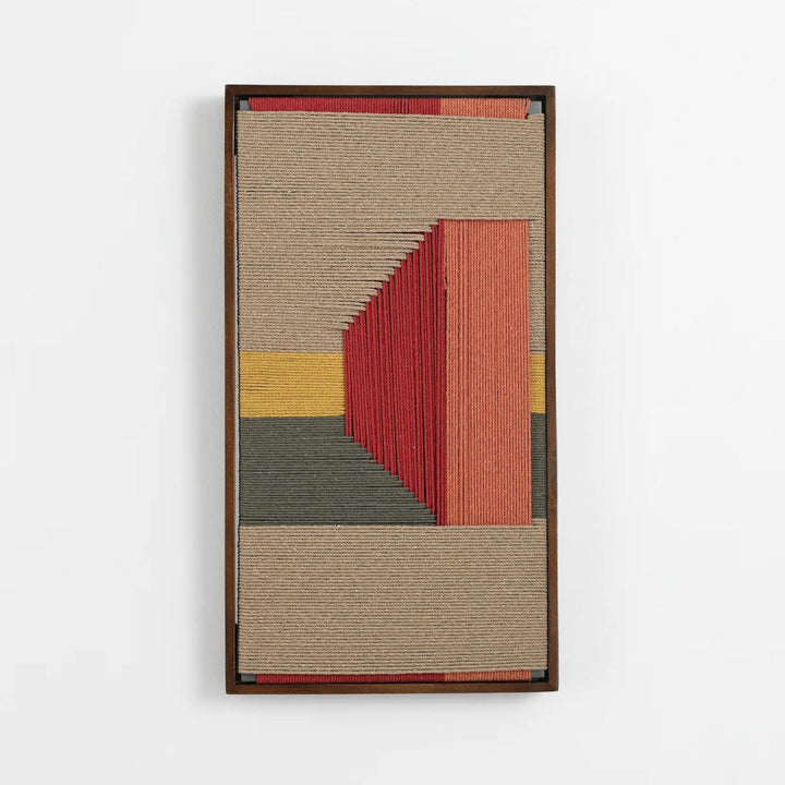 A framed abstract textile wall art piece featuring vertical and geometric woven bands