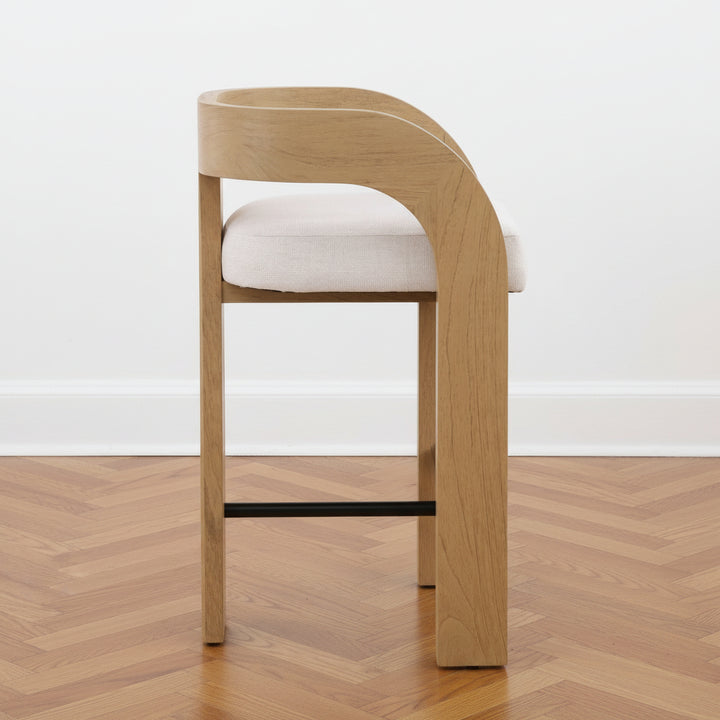 Wooden counter stool with white cushion