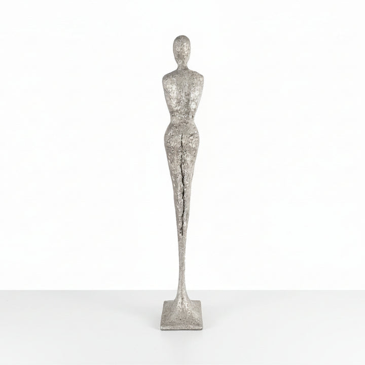 TALL CHISELED SILVER LEAF MALE & FEMALE SCULPTURES