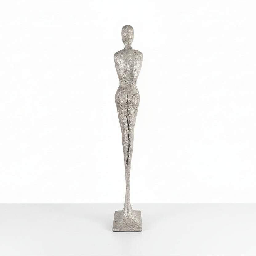 TALL CHISELED SILVER LEAF MALE & FEMALE SCULPTURES