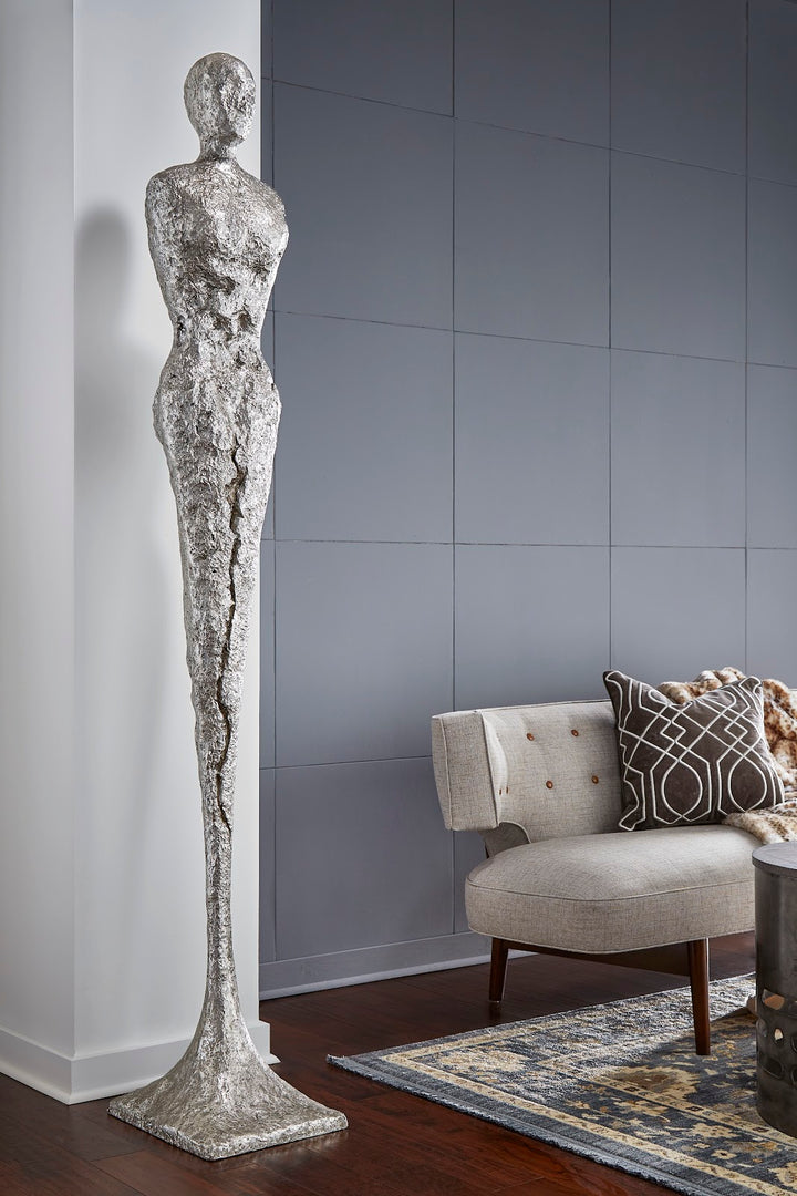 TALL CHISELED SILVER LEAF MALE & FEMALE SCULPTURES