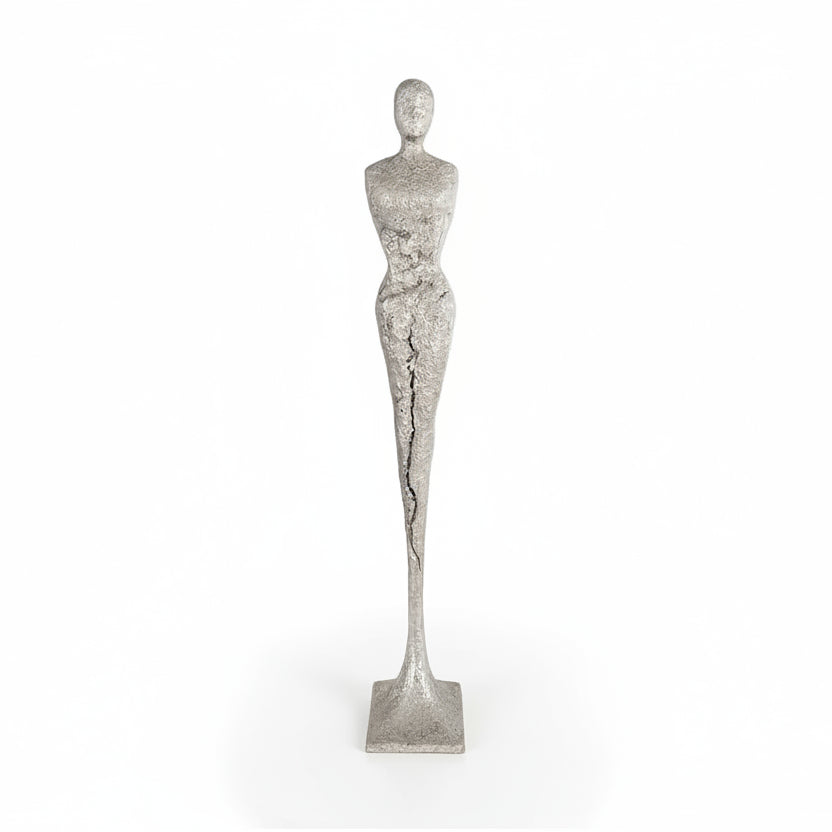 TALL CHISELED SILVER LEAF MALE & FEMALE SCULPTURES