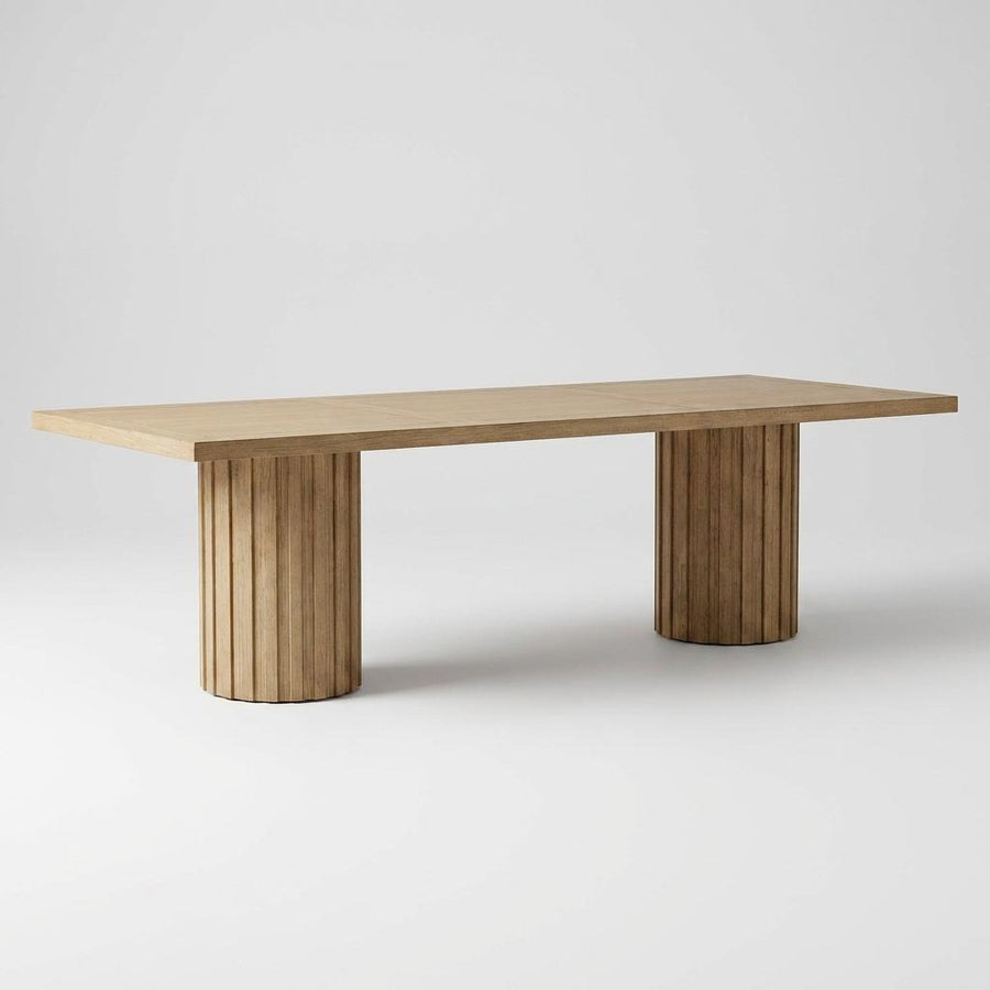 Wooden table with cylindrical legs on a plain background