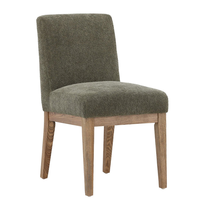 Chair with green upholstered seat and backrest on a white background