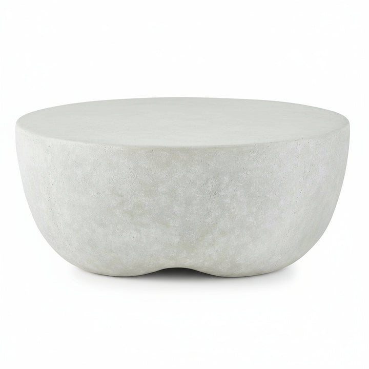 Concrete coffee table on a concrete floor with a neutral background