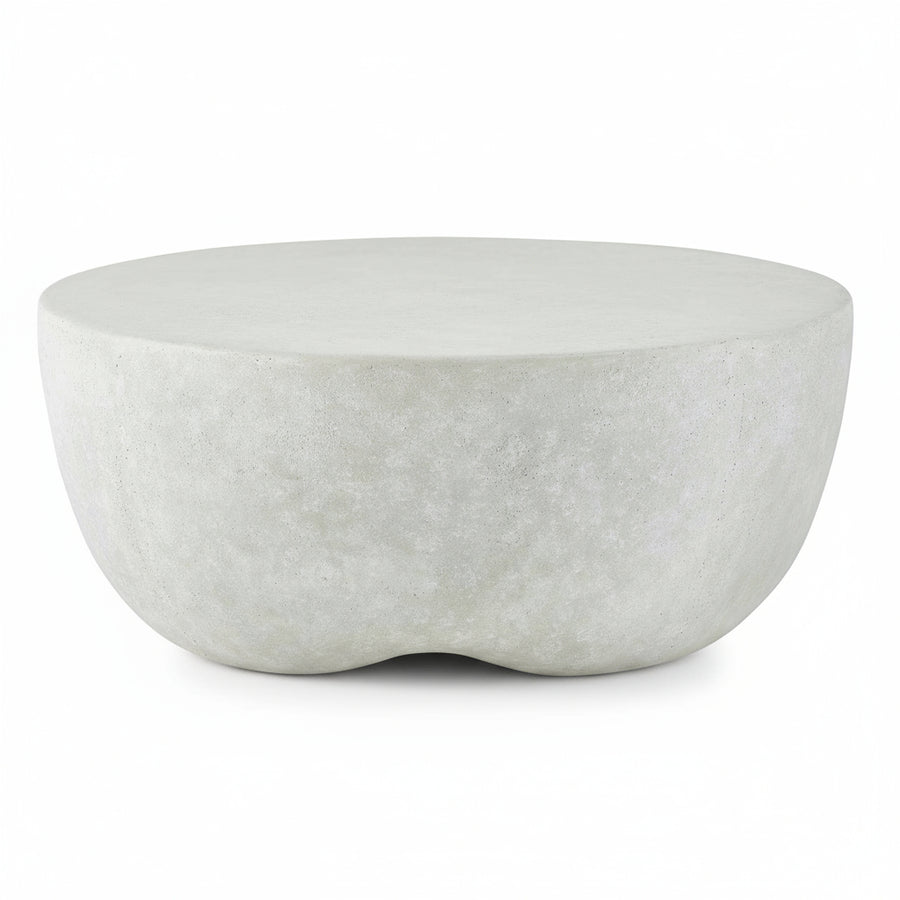 Concrete coffee table on a concrete floor with a neutral background