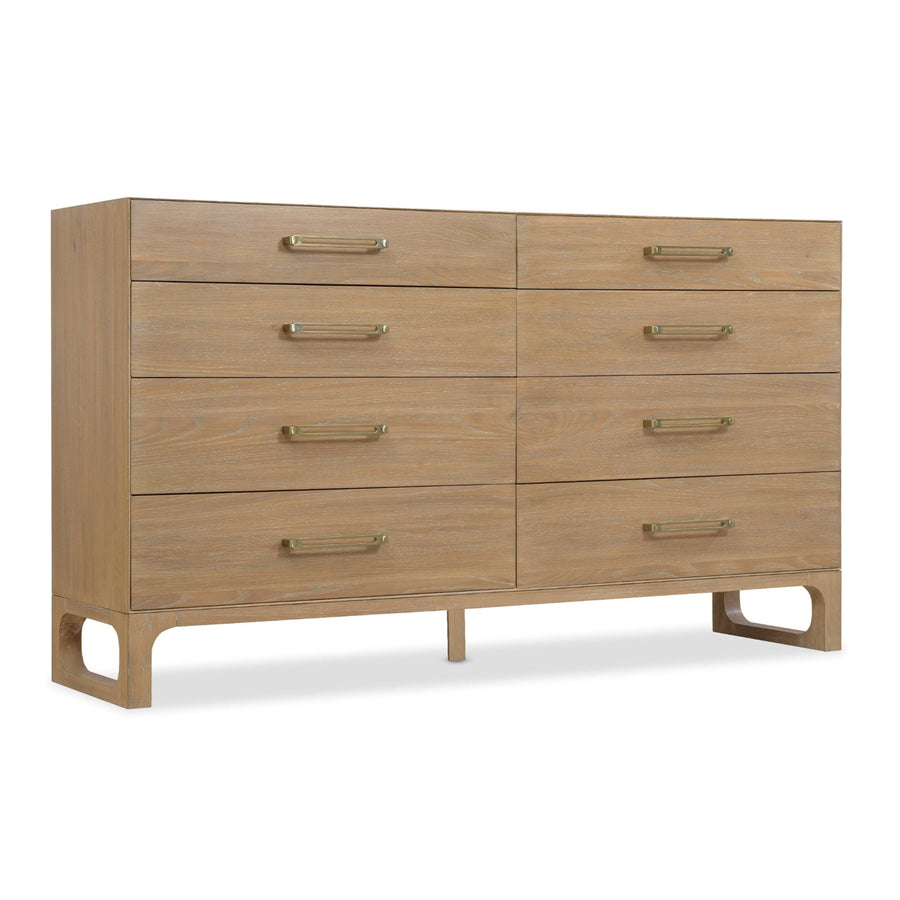 Banyon wooden dresser in light oak finish, featuring eight drawers with sleek brass handles and a minimalistic design.