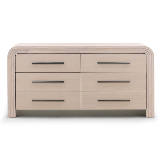 Front view of a light wood dresser with rounded edges, featuring six drawers with sleek metal handle.