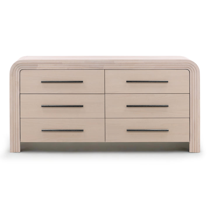 Front view of a light wood dresser with rounded edges, featuring six drawers with sleek metal handle.