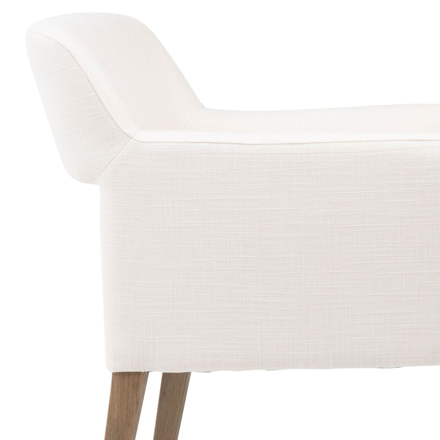 White chair with wooden legs on a white background