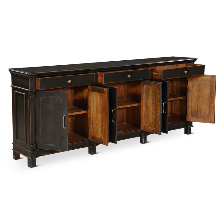 Wooden sideboard with distressed black finish and open doors on a white background