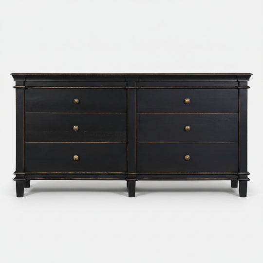 Black dresser with gold accents on a white background