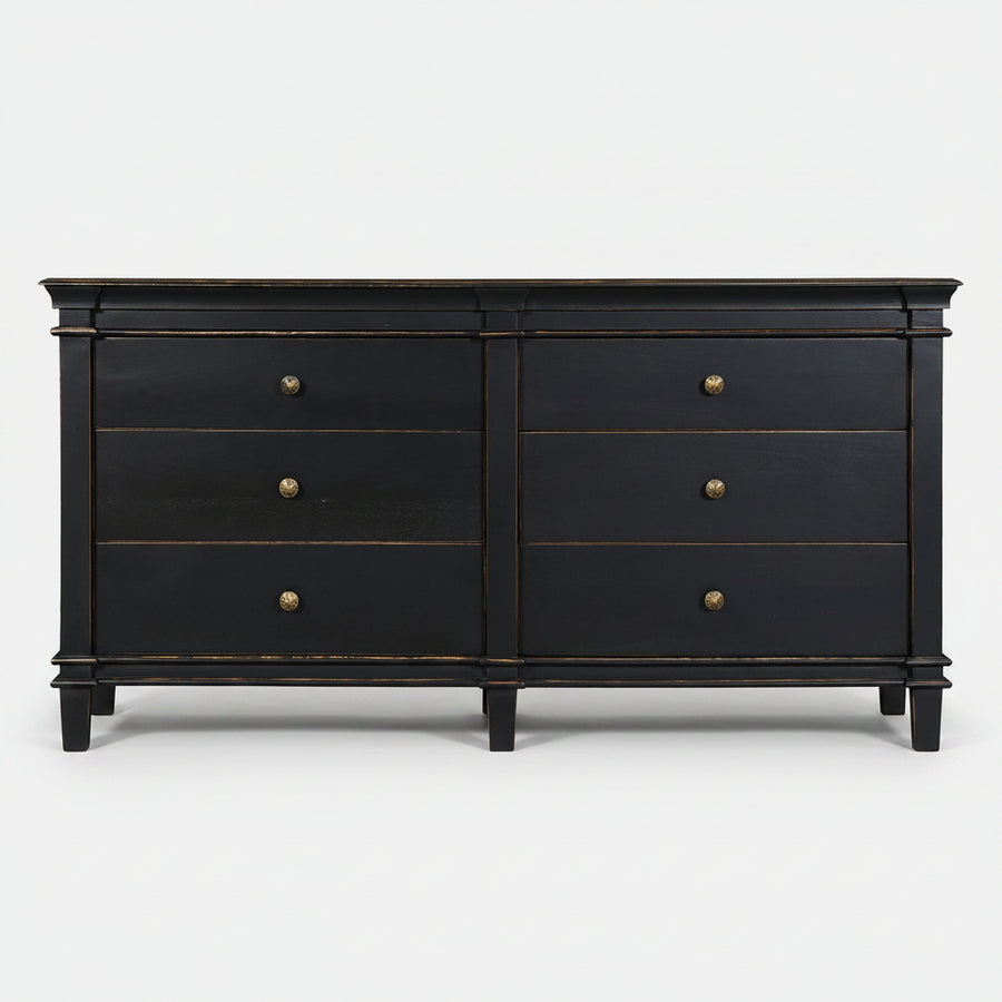 Black dresser with gold accents on a white background