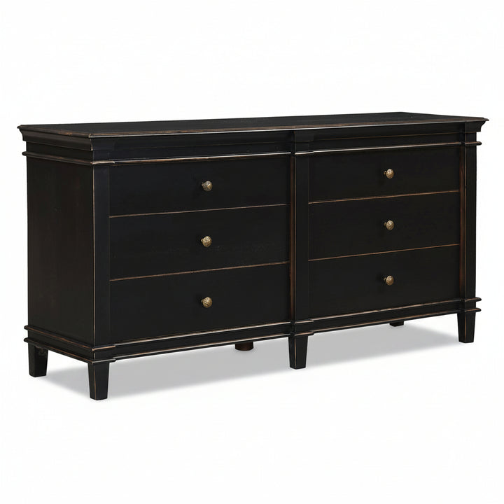 Black dresser with gold accents on neutral background