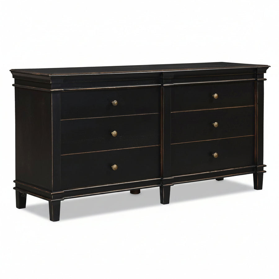 Black dresser with gold accents on neutral background