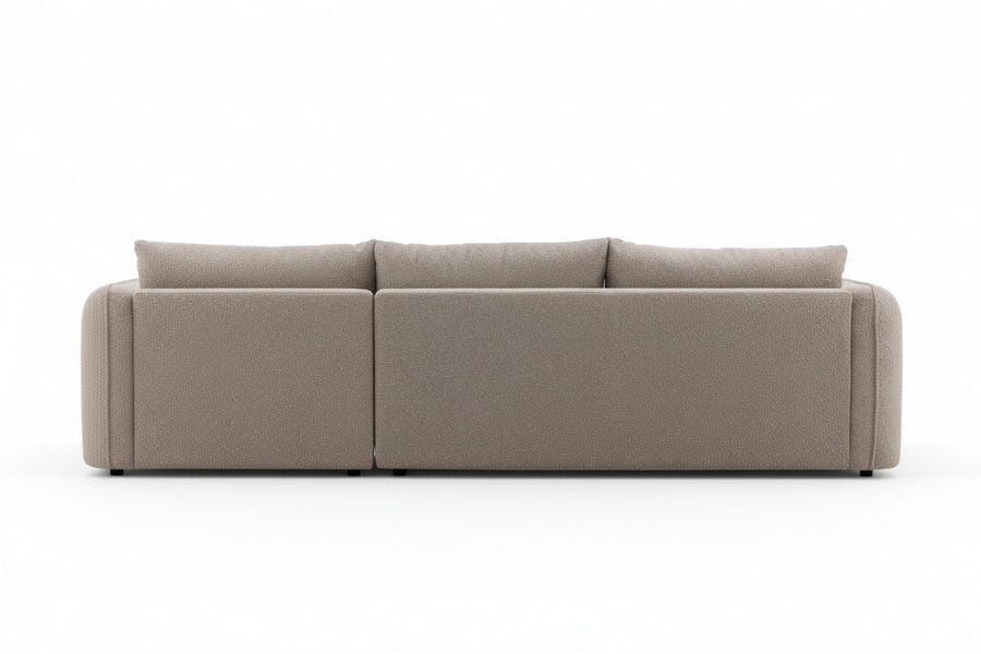 Beige sectional sofa on a white background
