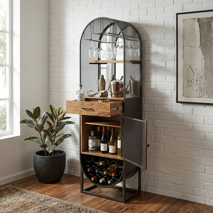 tall arched industrial wine and bar cabinet made of dark iron mesh, mirrored glass, and mango wood