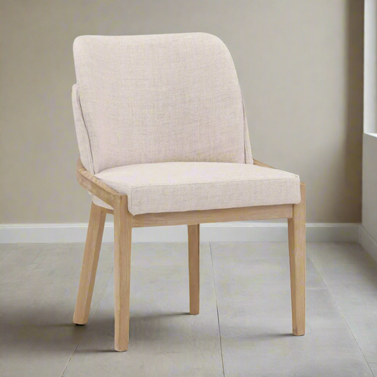 Beige upholstered chair with wooden legs