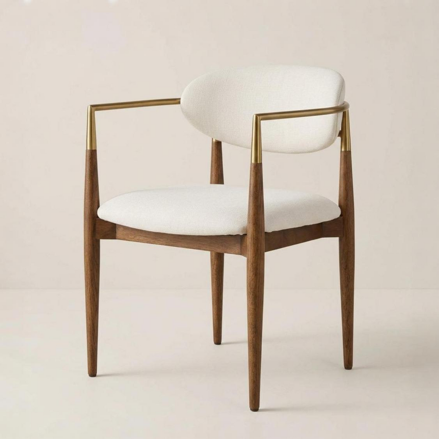 Chair with white cushioned seat and backrest on a plain background