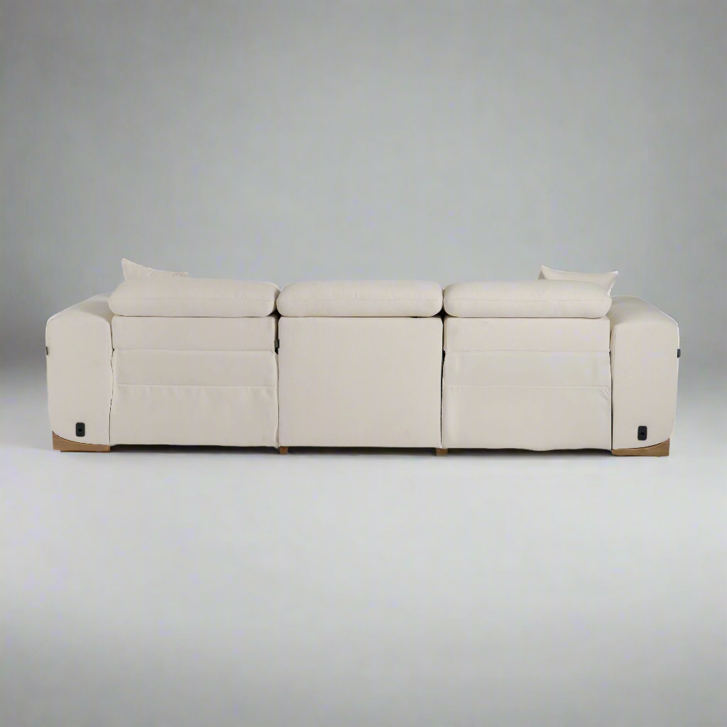 A modern, light beige sectional sofa with plush cushions and a sleek design, showcased against a neutral background.