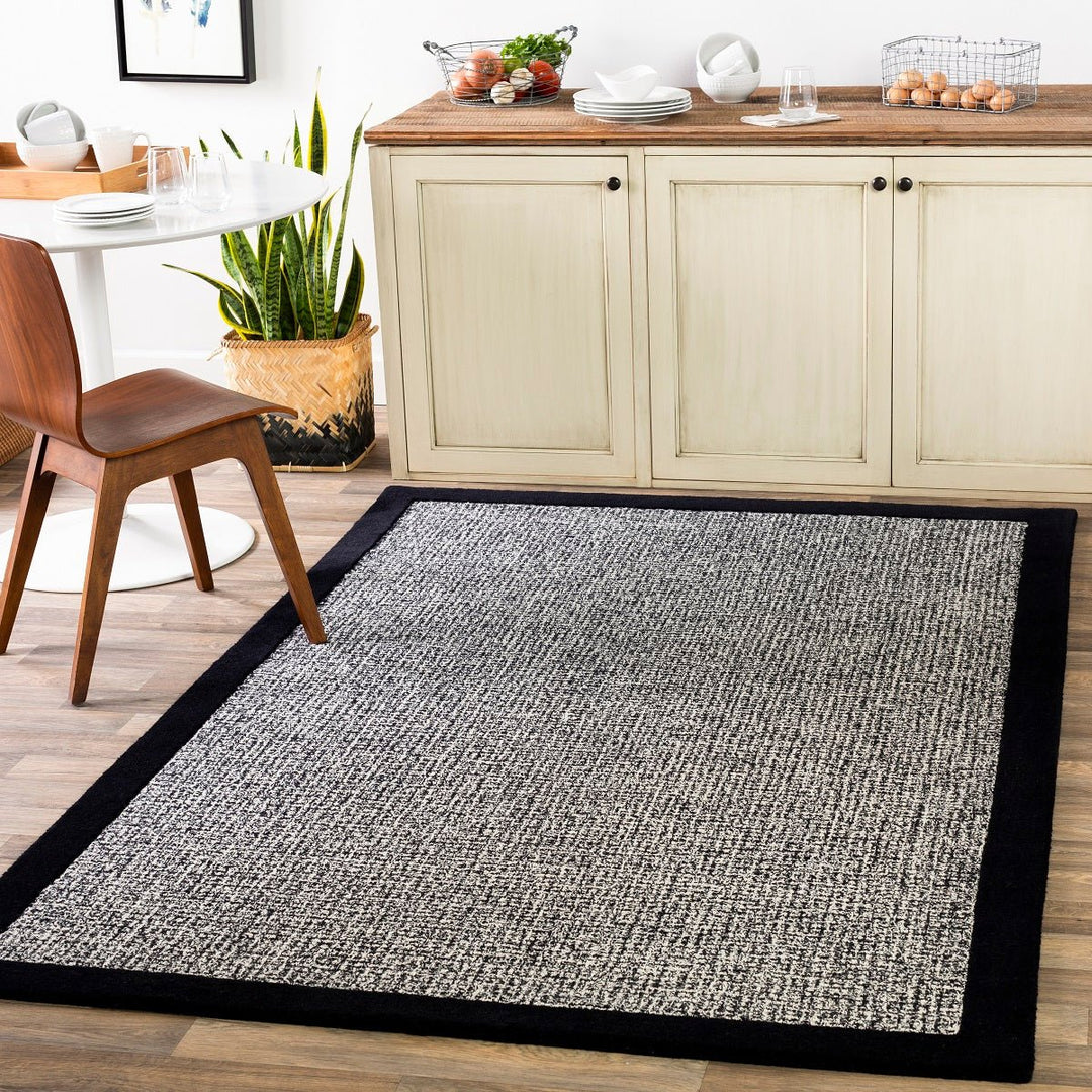 HAND TUFTED WOOL BORDER RUG: BLACK