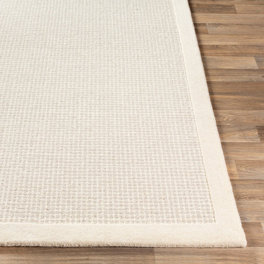 HAND TUFTED WOOL BORDER RUG: CREAM