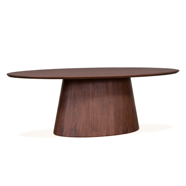 An oval wooden dining table with a tapered pedestal base, crafted in a rich dark walnut finish, shown against a plain white background.