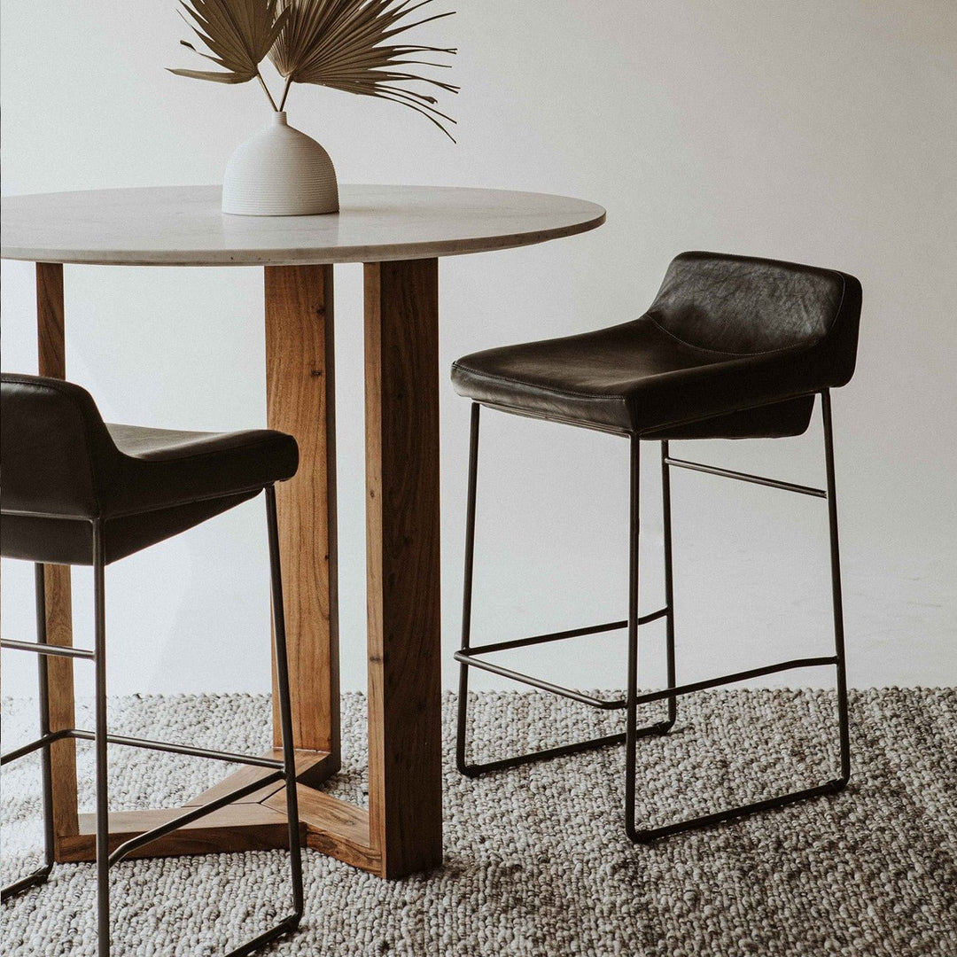 INDUSTRIAL SADDLE STOOLS: BLACK LEATHER | SET OF 2