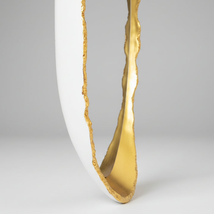 close-up of a gold framed mirror