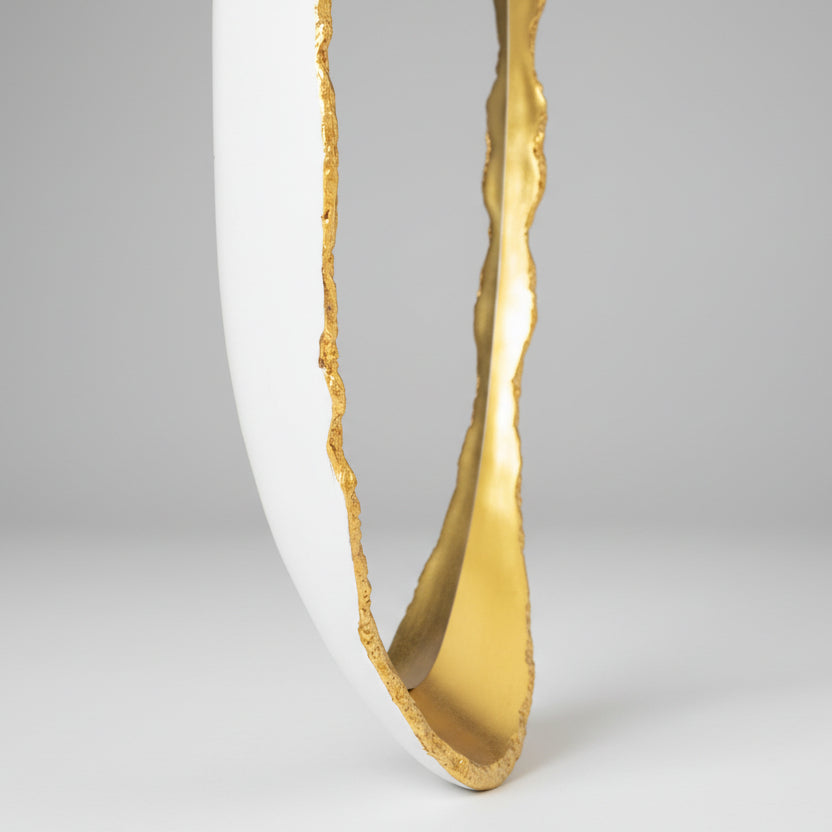 close-up of a gold framed mirror