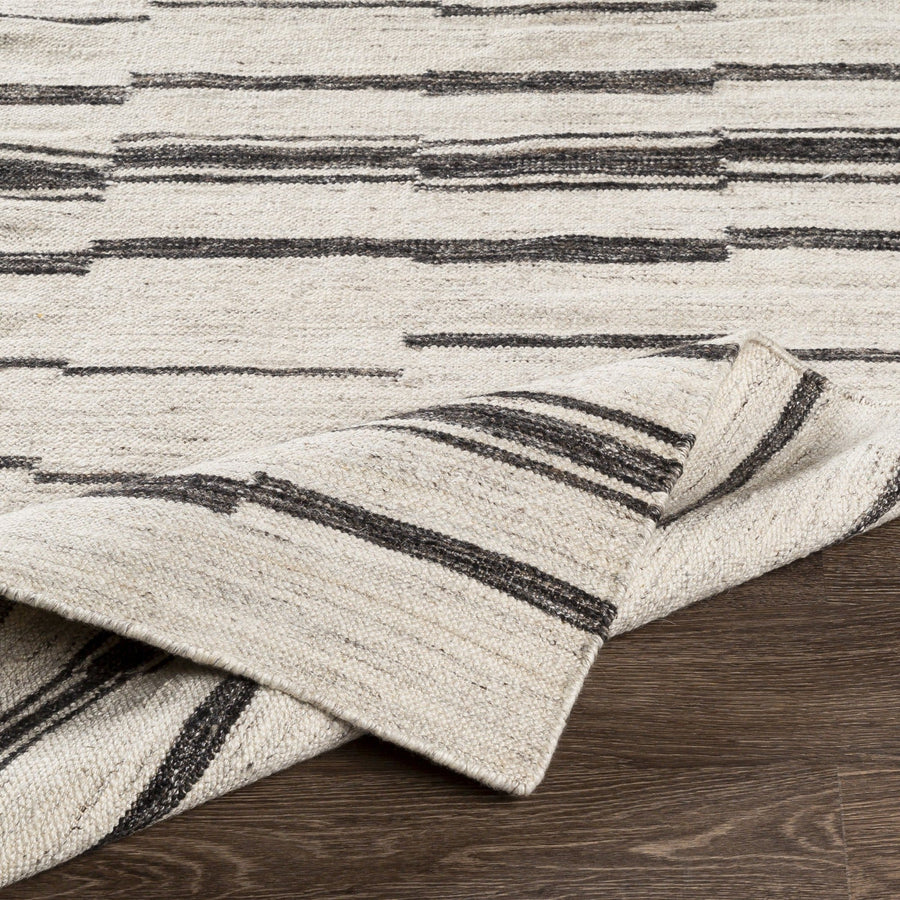 MAKI WOOL + VISCOSE FLAT RUG: NATURAL, BLACK