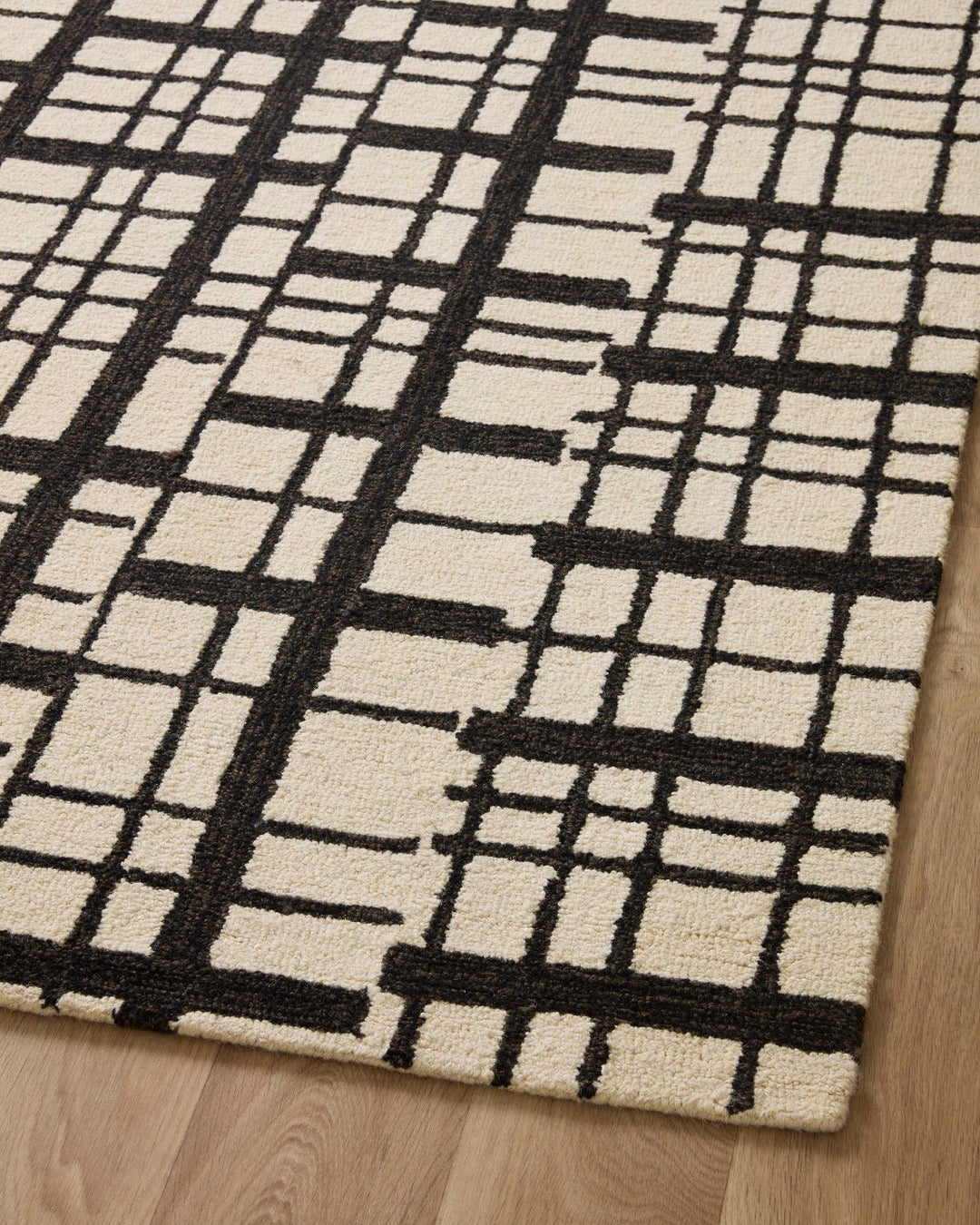 POLLY HAND - TUFTED WOOL + JUTE RUG: BLACK, IVORY