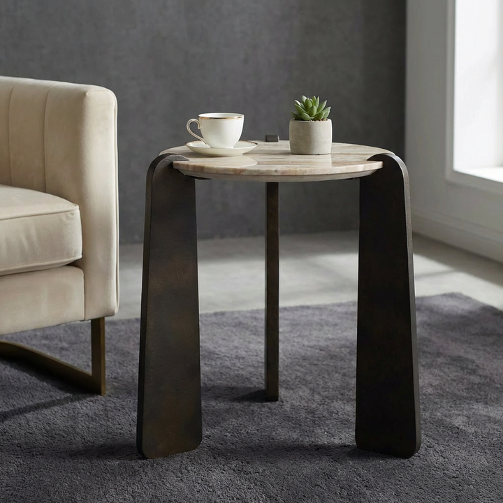 Modern side table with a cup and plant in a living room setting
