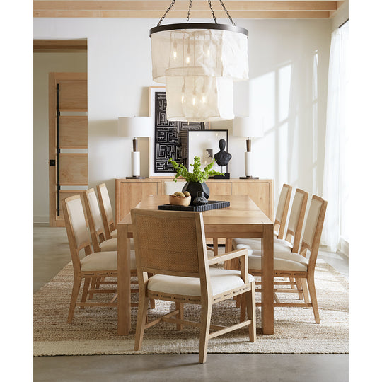 Retreat dining table with clean lines and wooden texture.