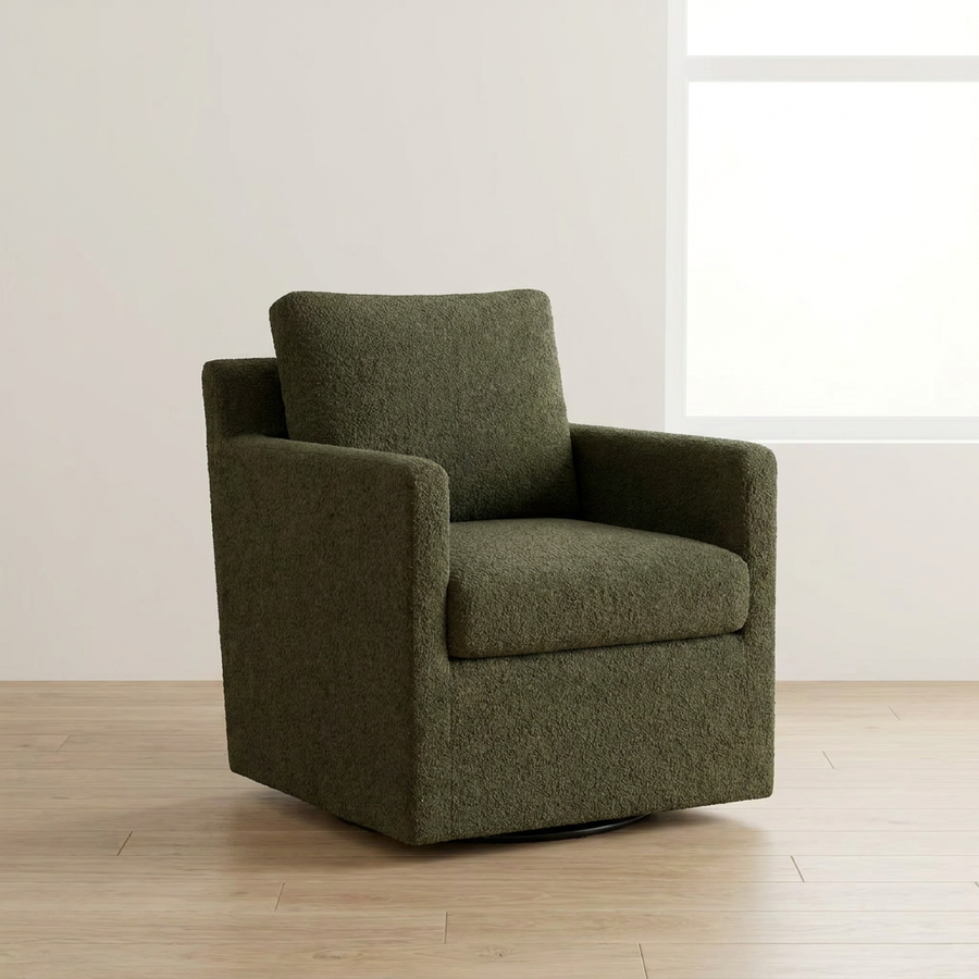 armchair on a wooden floor with a white wall background