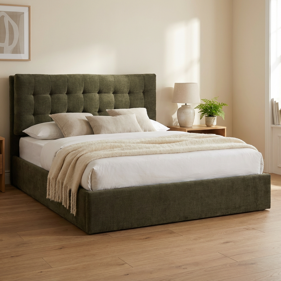Green upholstered bed with white bedding in a bedroom setting