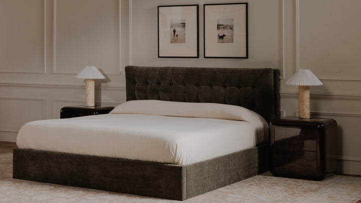 Green upholstered bed