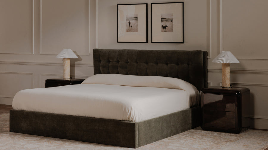 Green upholstered bed