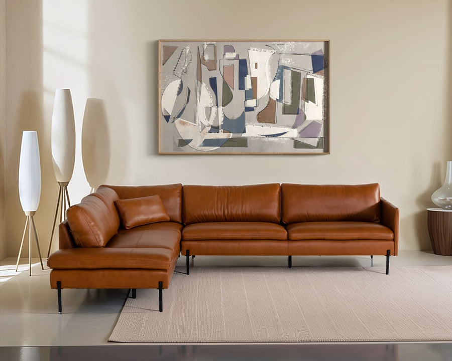 A stylish brown leather sectional sofa accompanied by modern lamps and an abstract art piece on the wall.