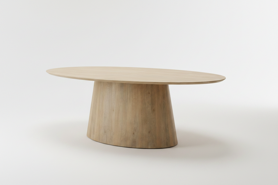 An oval wooden dining table with a tapered, rounded pedestal base, shown on a clean white studio background.