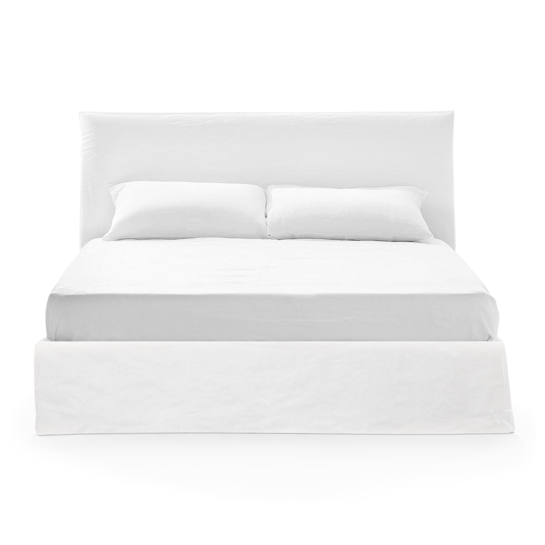 white linen slipcover bed
