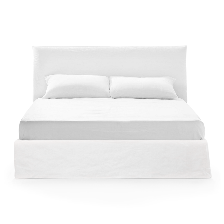 white linen slipcover bed